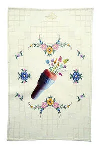 Print and embroidery. A sex toy with embroidered flowers bursting out of it.
